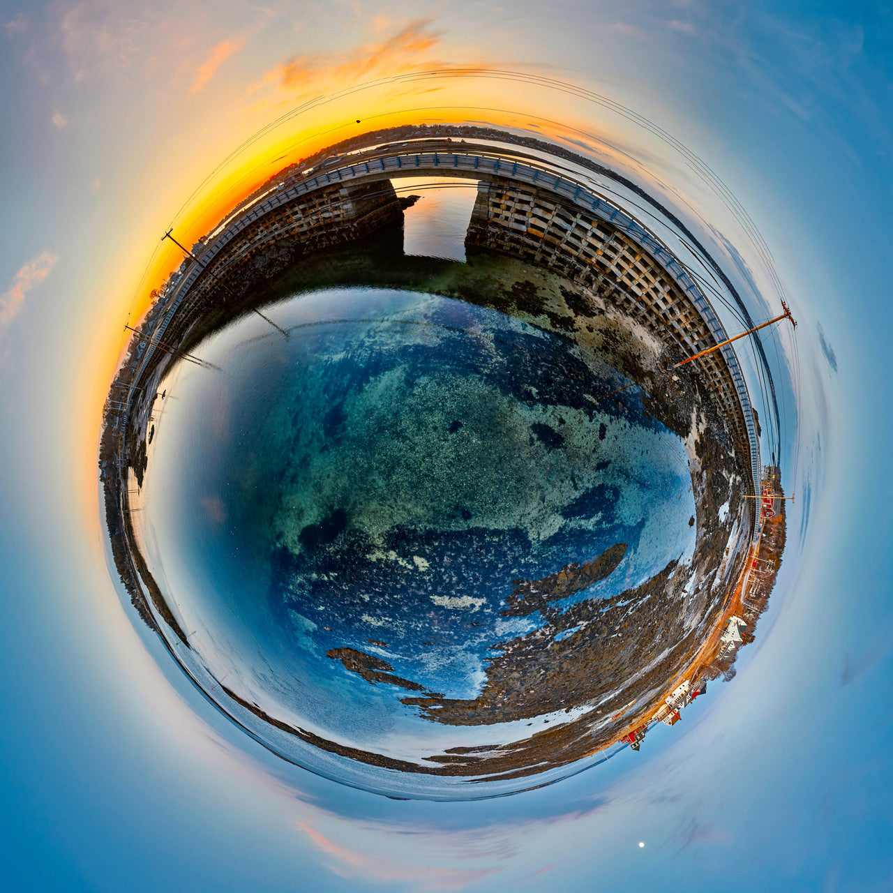 A 360-degree panoramic Spherescape depicting an infrared view of a small shipwreck in Cundy's Harbor, Harpswell, Maine, with foliage in vivid red and water in soft aqua hues, creating a surreal maritime scene