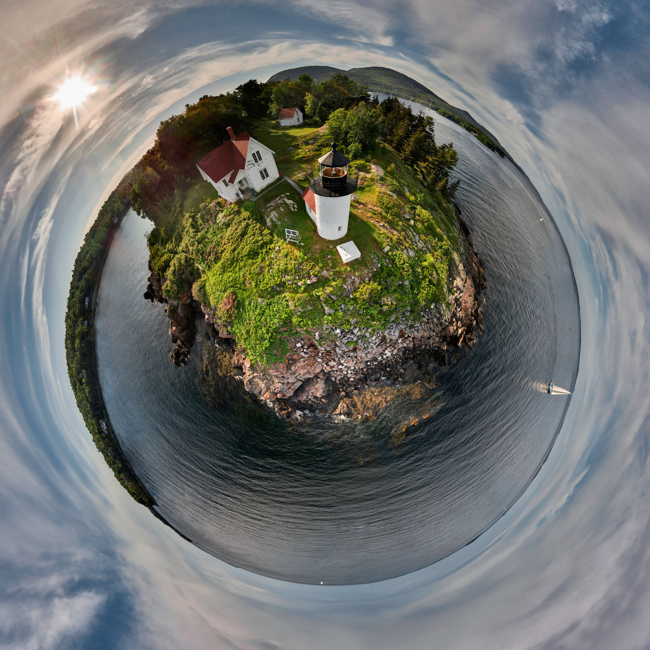 Late afternoon at Curtis Island Light in Camden Harbor, Maine, captured in a 360-degree Spherescape, with the lighthouse perched on a rocky outcrop enveloped by the gentle embrace of the sea and sky.